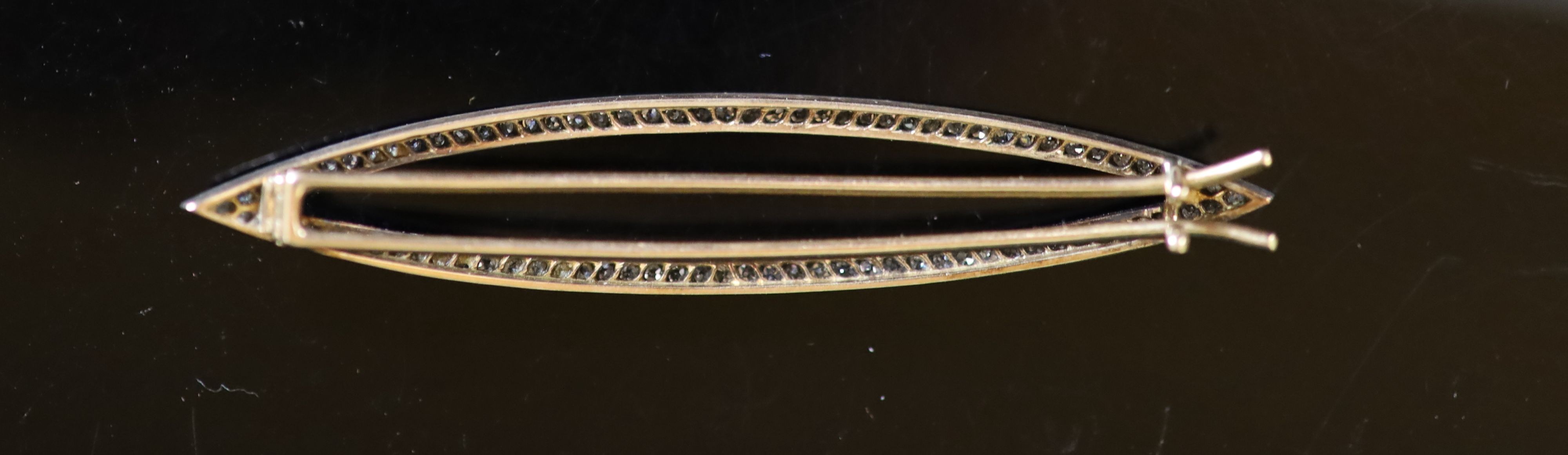 An Edwardian gold, silver and rose cut diamond set navette shaped hair ornament
